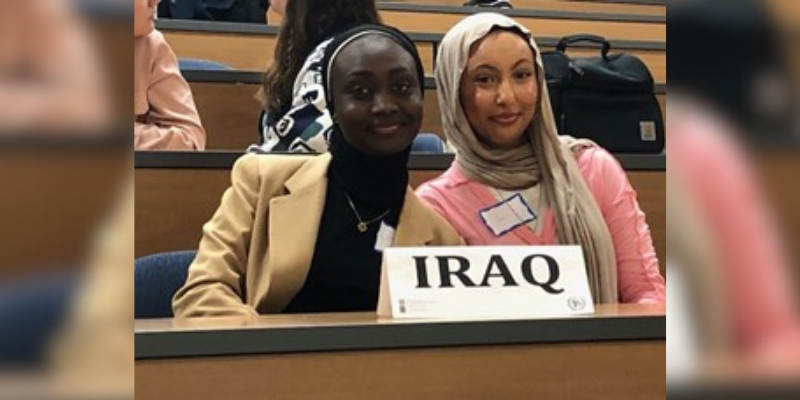 Aisha Makama (left) and Tahanie Ahmed (right) at the delegates table at UB.
