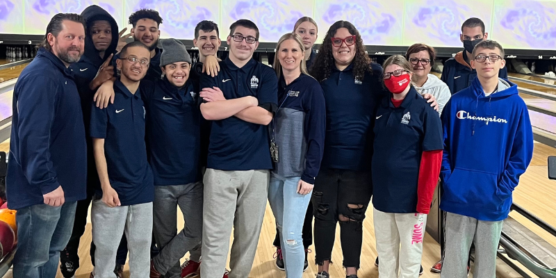 Unified Bowling team poses at the bowling alley.